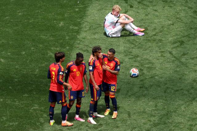 Spain's forward #07 Ferran Torres, forward #17 Nico Williams, forward #19 Lamine Yamal and defender #12 Pedro Porro celebrate past Belgium's defender #18 Joaquin Seys after winning the 2026 World Cup football tournament quarter-final match between Spain and Belgium at the Los Angeles Stadium in Inglewood on July 10, 2026.  (Photo by VALERIE MACON / AFP)