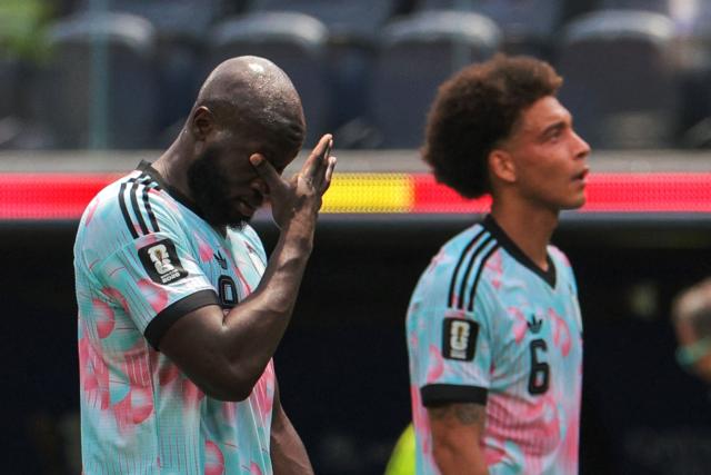 Belgium's forward #09 Romelu Lukaku (L) reacts after losing the 2026 World Cup football tournament quarter-final match between Spain and Belgium at the Los Angeles Stadium in Inglewood on July 10, 2026.  (Photo by Etienne LAURENT / AFP)