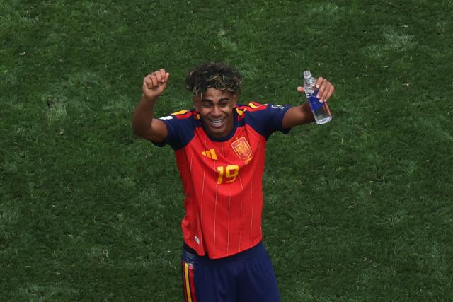 Spain's forward #19 Lamine Yamal celebrates after winning the 2026 World Cup football tournament quarter-final match between Spain and Belgium at the Los Angeles Stadium in Inglewood on July 10, 2026.  (Photo by VALERIE MACON / AFP)