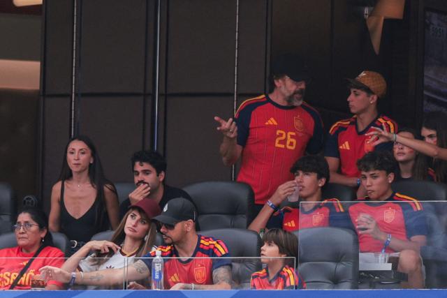 (3rd row) Spanish actor Javier Bardem (L), (1st row) Penelope Cruz (2nd-L), and her brother Eduardo Cruz (3d-L) attend the 2026 World Cup football tournament quarter-final match between Spain and Belgium at the Los Angeles Stadium in Inglewood on July 10, 2026.  (Photo by Etienne LAURENT / AFP)