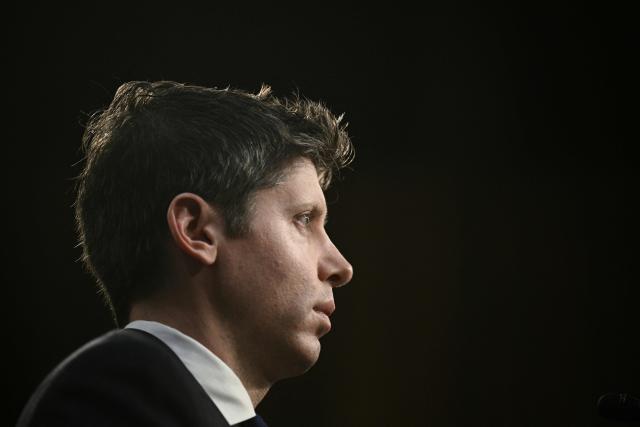 Open AI CEO Sam Altman prepares for a US Senate Commerce Committee hearing on artificial intelligence (AI) on Capitol Hill in Washington, DC, on May 8, 2025. Apple on July 10 sued OpenAI, accusing the artificial intelligence company of orchestrating a campaign to steal the iPhone maker's trade secrets as it tries to develop its own consumer hardware device. The lawsuit -- filed in a federal court in San Jose, California -- paints a picture of an aggressive effort by OpenAI to poach Apple employees and extract confidential information to build its own device (Photo by Brendan SMIALOWSKI / AFP)
