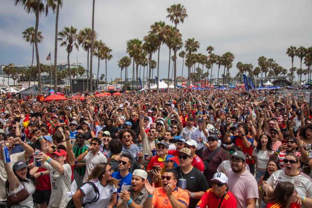 Spain fans celebrate a goal as they attend a watch party for the World Cup quarterfinal match between Spain and Belgium at the Venice Beach FIFA Fan Festival in Venice, California, on July 10, 2026. (Photo by Apu GOMES / AFP)