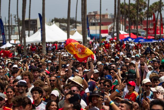 Fans attend a watch party for the World Cup quarterfinal match between Spain and Belgium at the Venice Beach FIFA Fan Festival in Venice, California, on July 10, 2026. (Photo by Apu GOMES / AFP)