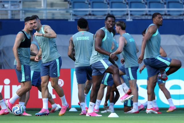 Switzerland's midfielder #10 Granit Xhaka (C-L) and forward #07 Breel Embolo (C-R) take part in a training session at Sporting KC Stadium in Kansas City on July 10, 2026, on the eve of the 2026 World Cup football match between Argentina and Switzerland. (Photo by Thomas COEX / AFP)