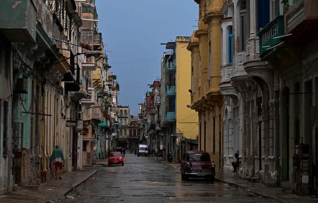 A view of a street in Havana during a widespread power cut on 10 July 2026. Cuba suffered its second nationwide blackout in five days on July 10 as twin energy and economic crises, compounded by a six-month US fuel blockade, caused the electricity grid to collapse. (Photo by YAMIL LAGE / AFP)