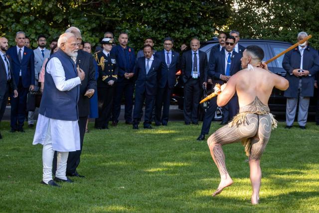 India's Prime Minister Narendra Modi is welcomed with a traditional Maori challenge at Government House in Wellington on July 11, 2026. (Photo by BRUCE MACKAY / POOL / AFP)