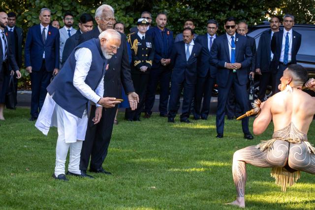 India's Prime Minister Narendra Modi is welcomed with a traditional Maori challenge at Government House in Wellington on July 11, 2026. (Photo by BRUCE MACKAY / POOL / AFP)