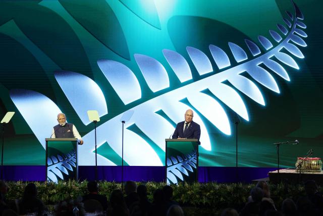 Indian Prime Minister Narendra Modi (L) and New Zealand Prime Minister Christopher Luxon (R) attend the Winning Partnership Celebration in Auckland on July 11, 2026. (Photo by Michael Bradley / POOL / AFP)