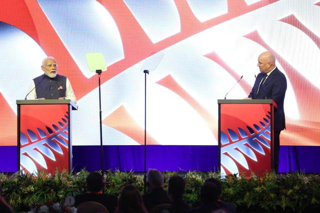Indian Prime Minister Narendra Modi (L) and New Zealand Prime Minister Christopher Luxon (R) attend the Winning Partnership Celebration in Auckland on July 11, 2026. (Photo by Michael Bradley / POOL / AFP)