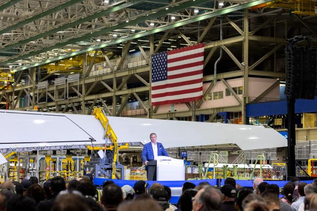 Mike Fleming, senior vice president of Airplane Programs and Customer Service of Boeing Commercial Airplanes, speaks during the opening of the company's new North Line assembly line, which will produce the 737 MAX aircraft, at the Boeing Everett Factory in Everett, Washington, on July 10, 2026. Boeing will mark another step in a marathon comeback July 10, when it commemorates expanded production of the 737 MAX, now an aircraft in heavy demand after earlier disasters tarnished the company's reputation. Boeing has big plans for the North Line, envisioning a production cadence comparable to that in Renton, 35 miles to the south, which until this week was the exclusive home of MAX assembly. (Photo by Jason Redmond / AFP)