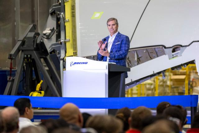 Mike Fleming, senior vice president of Airplane Programs and Customer Service of Boeing Commercial Airplanes, speaks during the opening of the company's new North Line assembly line, which will produce the 737 MAX aircraft, at the Boeing Everett Factory in Everett, Washington, on July 10, 2026. Boeing will mark another step in a marathon comeback July 10, when it commemorates expanded production of the 737 MAX, now an aircraft in heavy demand after earlier disasters tarnished the company's reputation. Boeing has big plans for the North Line, envisioning a production cadence comparable to that in Renton, 35 miles to the south, which until this week was the exclusive home of MAX assembly. (Photo by Jason Redmond / AFP)