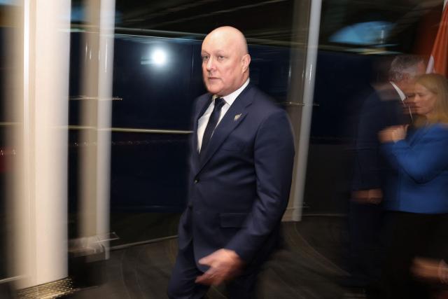 New Zealand Prime Minister Christopher Luxon arrives to speak to the media after events with Indian Prime Minister Narendra Modi (not pictured) in Auckland on July 11, 2026. (Photo by Michael Bradley / POOL / AFP)