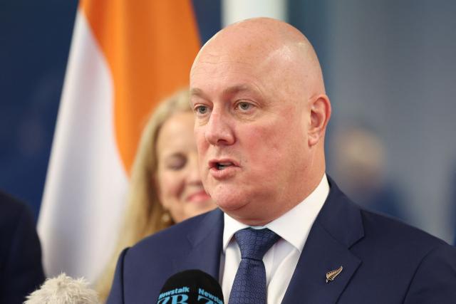 New Zealand Prime Minister Christopher Luxon speaks to the media after events with Indian Prime Minister Narendra Modi (not pictured) in Auckland on July 11, 2026. (Photo by Michael Bradley / POOL / AFP)