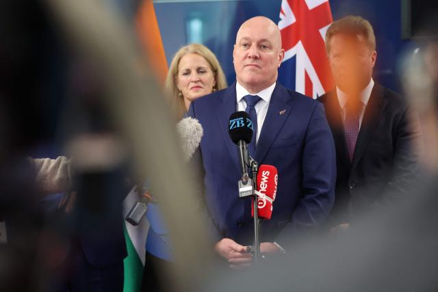 New Zealand Prime Minister Christopher Luxon speaks to the media after events with Indian Prime Minister Narendra Modi (not pictured) in Auckland on July 11, 2026. (Photo by Michael Bradley / POOL / AFP)