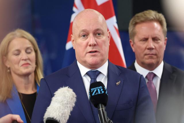 New Zealand Prime Minister Christopher Luxon speaks to the media after events with Indian Prime Minister Narendra Modi (not pictured) in Auckland on July 11, 2026. (Photo by Michael Bradley / POOL / AFP)