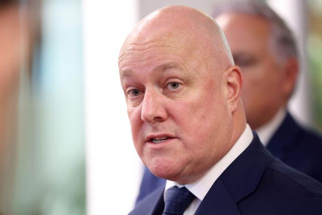 New Zealand Prime Minister Christopher Luxon speaks to the media after events with Indian Prime Minister Narendra Modi (not pictured) in Auckland on July 11, 2026. (Photo by Michael Bradley / POOL / AFP)