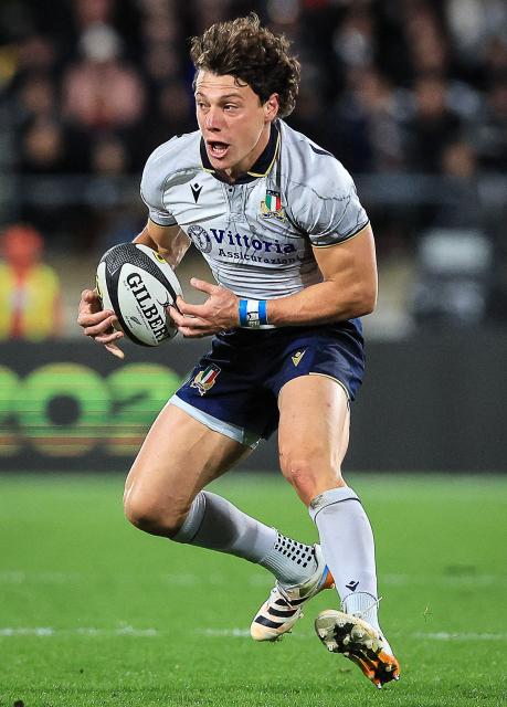 Paolo Garbisi of Italy runs the ball during the Nations Championship match between the New Zealand All Blacks and Italy at HNRY Stadium in Wellington on July 11, 2026. (Photo by Grant Down / AFP)
