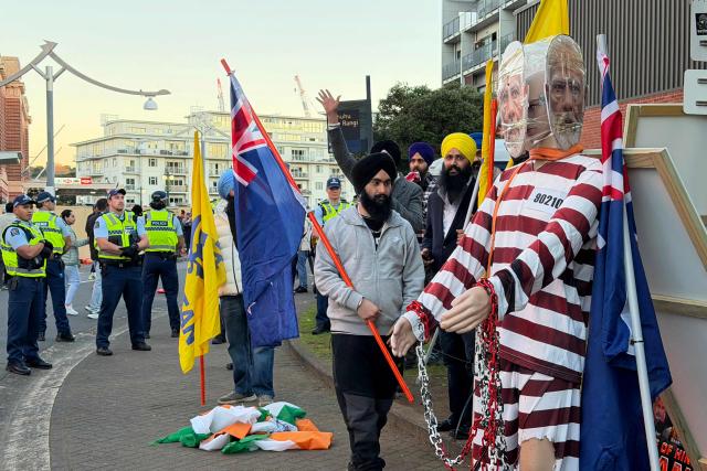 CORRECTION / Members of the local Sikh community protest outside a venue where India's Prime Minister Narendra Modi is appearing in front of 10,000 members of the local Indian community in Auckland on July 11, 2026. (Photo by Ben STRANG / AFP) / “The erroneous mention[s] appearing in the metadata of this photo by Ben STRANG has been modified in AFP systems in the following manner: AFP as source instead of POOL. Please immediately remove the erroneous mention[s] from all your online services and delete it (them) from your servers. If you have been authorized by AFP to distribute it (them) to third parties, please ensure that the same actions are carried out by them. Failure to promptly comply with these instructions will entail liability on your part for any continued or post notification usage. Therefore we thank you very much for all your attention and prompt action. We are sorry for the inconvenience this notification may cause and remain at your disposal for any further information you may require.”