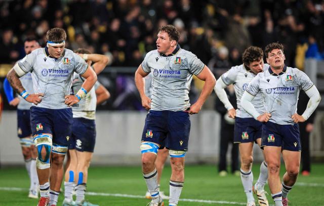Italian players look on after losing the rugby union Nations Championship match against New Zealand at HNRY Stadium in Wellington on July 11, 2026. (Photo by Grant Down / AFP)