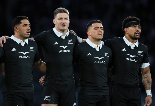 Anton Lienert-Brown (L), Jordie Barrett (2nd L), Codie Taylor (2nd R) and Ardie Savea (R) of New Zealand sing the national anthem before the rugby union Nations Championship match between New Zealand and Italy at HNRY Stadium in Wellington on July 11, 2026. (Photo by Grant Down / AFP)