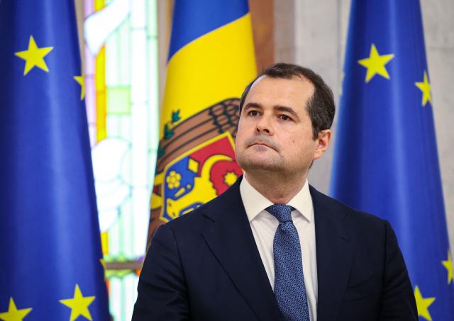 Newly-nominated Moldova's Prime Minister Vasile Tofan looks on during a press conference at the Presidential Palace in Chisinau on July 11, 2026. President Maia Sandu announced the nomination of Tofan, a 44-year-old Harvard-educated financier following the sudden resignation of former Prime Minister Alexandru Munteanu amid growing political pressure and corruption allegations in a state-owned enterprise. (Photo by Elena COVALENCO / AFP)