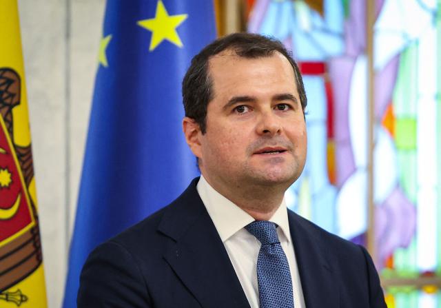 Newly-nominated Moldova's Prime Minister Vasile Tofan looks on during a press conference at the Presidential Palace in Chisinau on July 11, 2026. President Maia Sandu announced the nomination of Tofan, a 44-year-old Harvard-educated financier following the sudden resignation of former Prime Minister Alexandru Munteanu amid growing political pressure and corruption allegations in a state-owned enterprise. (Photo by Elena COVALENCO / AFP)