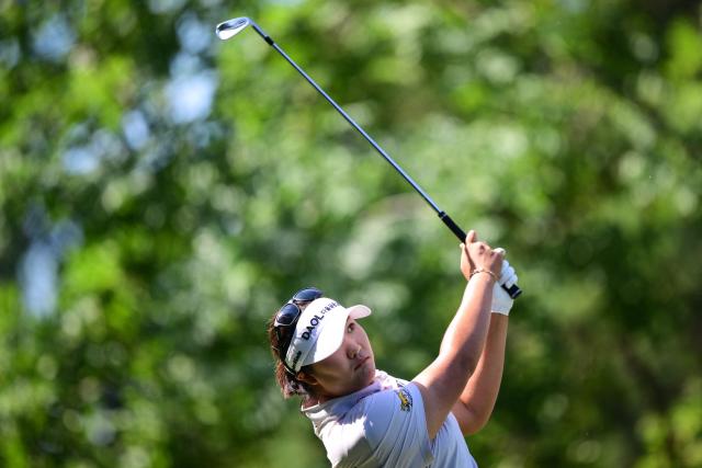 Japan's Aki Iwai competes during the third round of the Amundi Evian Championship at Evian Resort Golf Club, in Evian-Les-Bains, central-eastern France on July 11, 2026. (Photo by OLIVIER CHASSIGNOLE / AFP)