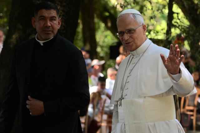 Pope Leo XIV arrives for the event "Lunch with the Pope" with around 200 socially vulnerable people from the Diocese of Rome, at Borgo Laudato Si' in the Pontifical Gardens of Castel Gandolfo, on July 11, 2026. (Photo by Tiziana FABI / AFP)