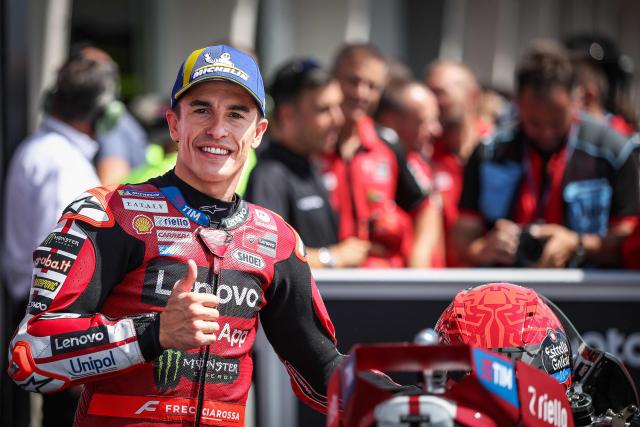 Ducati Lenovo Team's Spanish MotoGP rider Marc Marquez reacts after winning the qualifiying session of the German Motorcycle MotoGP Grand Prix at the Sachsenring race track in Hohenstein-Ernstthal near Chemnitz, eastern Germany, on July 11, 2026. (Photo by Ronny HARTMANN / AFP)
