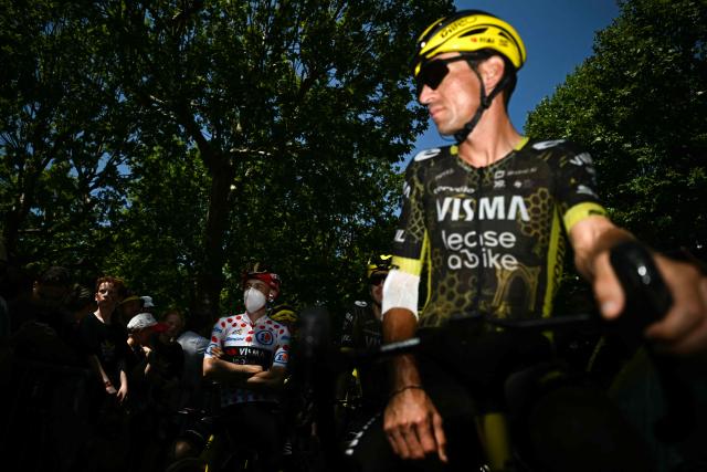 Team Visma | Lease a Bike's French rider Bruno Armirail (R) and Team Visma | Lease a Bike's Danish rider Jonas Vingegaard wearing the climber's dotted "King of the Mountains" jersey await the start of the 8th stage of the 113th edition of the Tour de France cycling race, 182 km between Périgueux and Bergerac in southwestern France, on July 11, 2026. (Photo by Loic VENANCE / AFP)