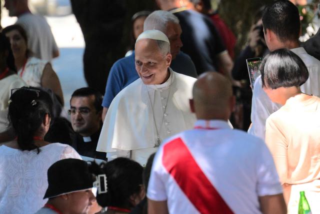 Pope Leo XIV attends the event "Lunch with the Pope" with around 200 socially vulnerable people from the Diocese of Rome, at Borgo Laudato Si' in the Pontifical Gardens of Castel Gandolfo, on July 11, 2026. (Photo by Tiziana FABI / AFP)