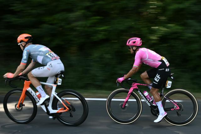 Netcompany INEOS team's Norwegian rider Tobias Foss (L) and EF Education - EasyPost team's Ecuadorian rider Richard Carapaz cycle during the 8th stage of the 113th edition of the Tour de France cycling race, 180,4 km between Perigueux and Bergerac in southwestern France, on July 11, 2026. (Photo by Jeff PACHOUD / AFP)