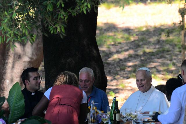 Pope Leo XIV attends the event "Lunch with the Pope" with around 200 socially vulnerable people from the Diocese of Rome, at Borgo Laudato Si' in the Pontifical Gardens of Castel Gandolfo, on July 11, 2026. (Photo by Tiziana FABI / AFP)