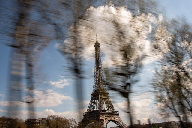 (FILES) A picture taken on April 13, 2018 shows the Eiffel Tower in Paris. The Eiffel Tower will close from 4:00 PM this weekend due to the heatwave, according to the operator on July 11, 2026. (Photo by Christophe SIMON / AFP)