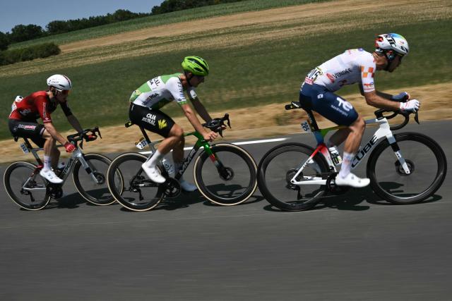 TotalEnergies team's French rider Thibault Guernalec, Caja Rural - Seguros RGA team's Czech rider Jakub Otruba and Lotto Intermarché team's Belgian rider Liam Slock cycle in a breakaway cycles during the 8th stage of the 113th edition of the Tour de France cycling race, 180,4 km between Perigueux and Bergerac in southwestern France, on July 11, 2026. (Photo by Jeff PACHOUD / AFP)