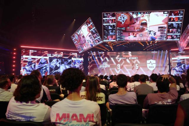 Spectators look at teams 100 Thieves and NongShim RedForce playing Valorant during the 2026 Esports World Cup at the Paris Expo Porte de Versailles venue in Paris, on July 11, 2026. (Photo by Thomas SAMSON / AFP)