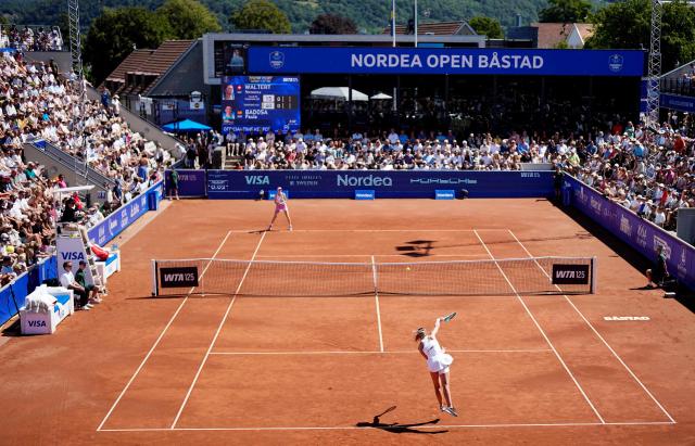 Switzerland's Simona Waltert (back) plays against Spain's Paula Badosa during the women's singles final match at the WTA Nordea Open tennis tournament at the Centre Court in Bastad, Sweden on July 11, 2026. (Photo by Bjorn LARSSON ROSVALL / TT News Agency / AFP) / Sweden OUT
