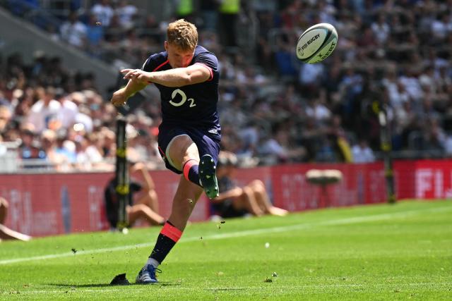 England's fly-half Fin Smith kicks to convert the team's first try during the Rugby Union Nations Championship match between Fiji and England at Hill Dickinson Stadium in Liverpool on July 11, 2026. (Photo by Oli SCARFF / AFP)