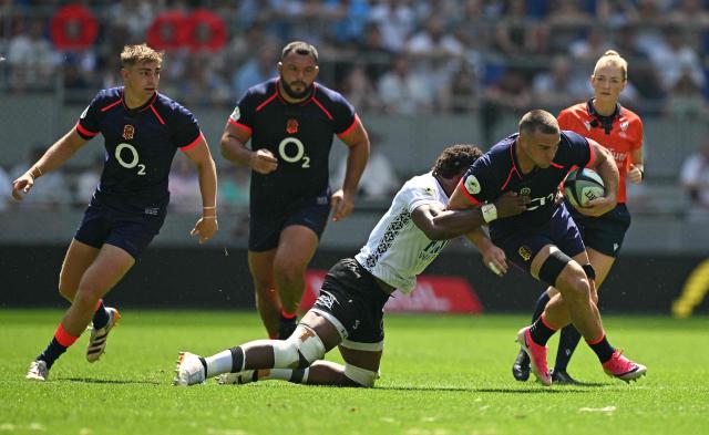 England's number 8 Ben Earl is tackled during the Rugby Union Nations Championship match between Fiji and England at Hill Dickinson Stadium in Liverpool on July 11, 2026. (Photo by Oli SCARFF / AFP)