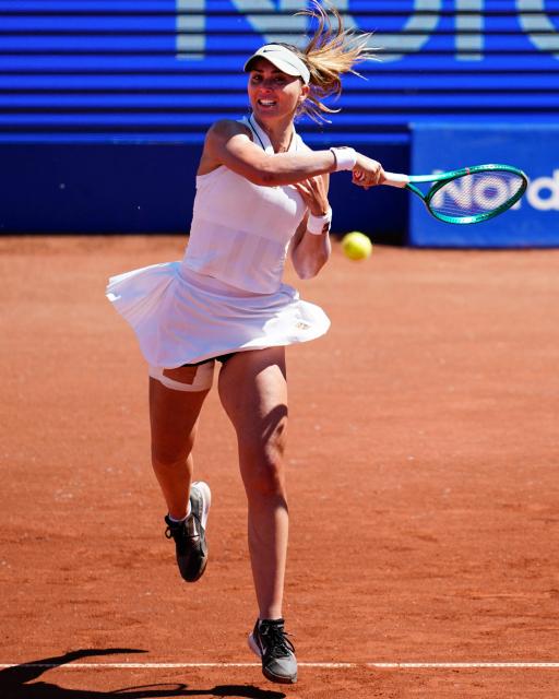 Spain's Paula Badosa returns the ball to Switzerland's Simona Waltert during the women's singles final match at the WTA Nordea Open tennis tournament in Bastad, Sweden on July 11, 2026. (Photo by Bjorn LARSSON ROSVALL / TT News Agency / AFP) / Sweden OUT