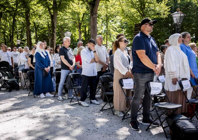 People take part in the national commemoration of the 31st anniversary of Srebrenica genocide, in The Hague on July 11, 2026. On July 11, 1995, Bosnian Serb forces captured the eastern Bosnian town, which was then a UN-protected enclave, and killed 8,000 Muslim men and boys in the following days. (Photo by Sem van der Wal / ANP / AFP) / Netherlands OUT