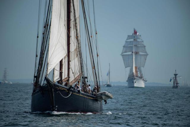 Ships make their way toward Boston during the Sail Boston Parade of Sail in Boston Harbor in Boston, Massachusetts on July 11, 2026. (Photo by Joseph Prezioso / AFP)