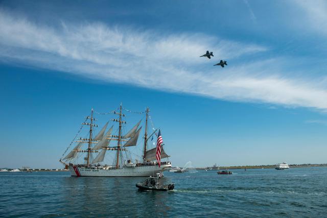 US Navy F-18 fighter jets perform a flyover during the Sail Boston Parade of Sail in Boston Harbor in Boston, Massachusetts on July 11, 2026. (Photo by Joseph Prezioso / AFP)