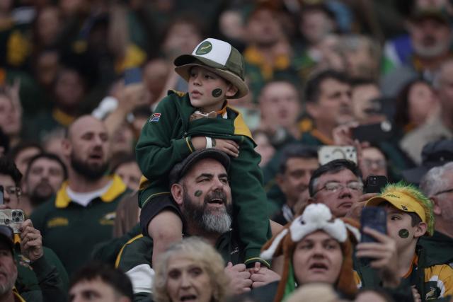 South African supporters sing the national anthem during the rugby Nations Championship match between South Africa and Scotland at Loftus Versfeld Stadium in Pretoria on July 11, 2026. (Photo by PHILL MAGAKOE / AFP)