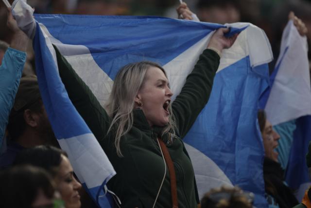 Scotland supporters sing the national anthem during the rugby Nations Championship match between South Africa and Scotland at Loftus Versfeld Stadium in Pretoria on July 11, 2026. (Photo by PHILL MAGAKOE / AFP)