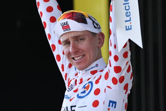 UAE Team Emirates - XRG's Slovenian rider Tadej Pogacar celebrates on the podium with the best climber's polka dot (dotted) jersey after the 8th stage of the 113th edition of the Tour de France cycling race, 182 km between Périgueux and Bergerac in southwestern France, on July 11, 2026. (Photo by Anne-Christine POUJOULAT / AFP)