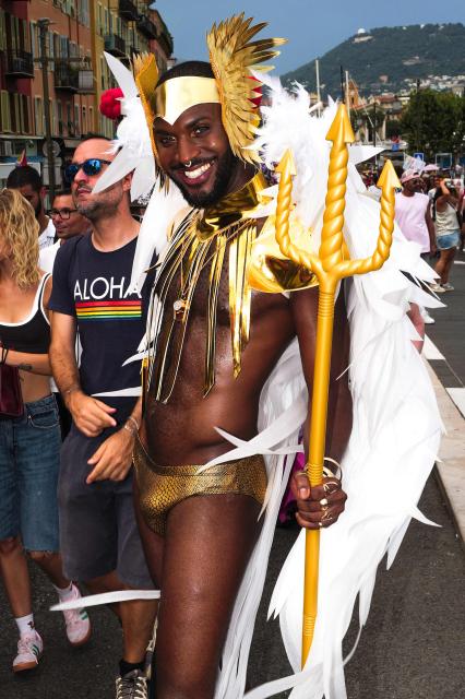 A participant poses during the "Pink Parade", a Pride parade in Nice, southeastern France on July 11, 2026. (Photo by Valery HACHE / AFP)