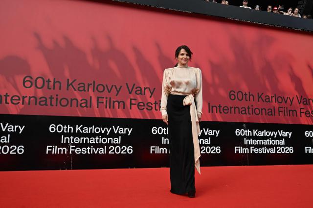French actress Juliette Binoche arrives on the red carpet for the closing ceremony of the 60th Karlovy Vary International Film Festival (KVIFF) in Karlovy Vary, Czech Republic on July 11, 2026. (Photo by Michal Cizek / AFP)
