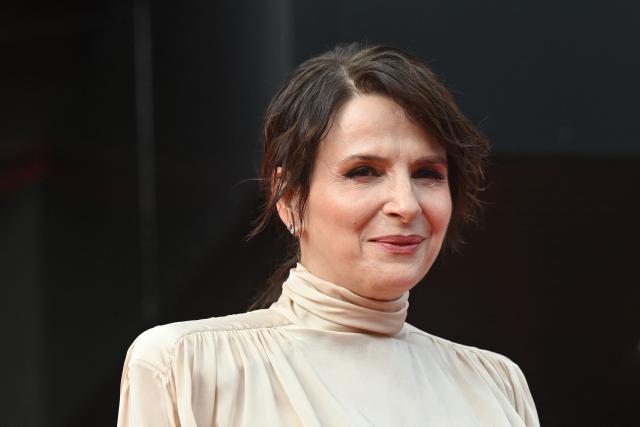 French actress Juliette Binoche arrives on the red carpet for the closing ceremony of the 60th Karlovy Vary International Film Festival (KVIFF) in Karlovy Vary, Czech Republic on July 11, 2026. (Photo by Michal Cizek / AFP)