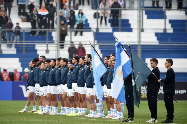 Arentina players line up during the national anthem before the Rugby Union Nations Championship match between Argentina and Wales at San Juan del Bicentenario Stadium in San Juan, Argentina, on July 11, 2026. (Photo by Andres LARROVERE / AFP)